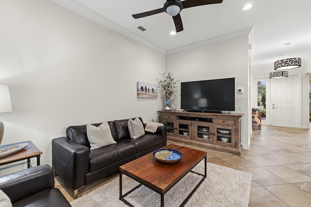 living room with light tile patterned floors, ornamental molding, and ceiling fan