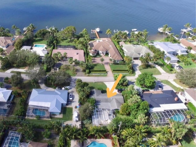 birds eye view of property featuring a water view