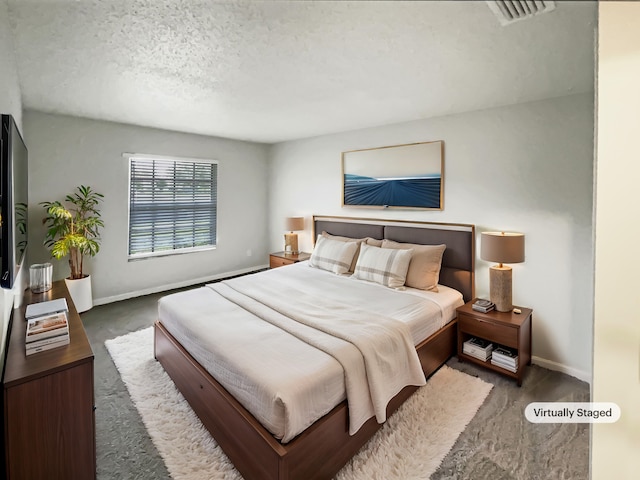 bedroom with a textured ceiling