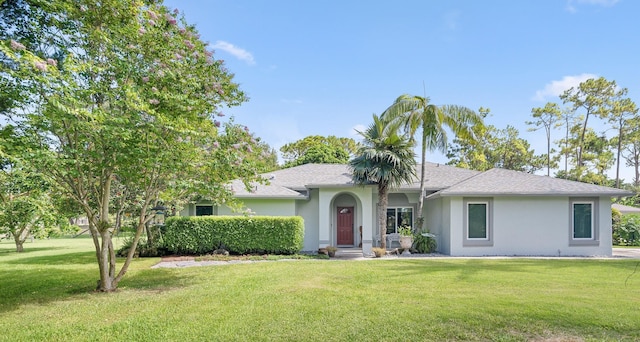 ranch-style house featuring a front yard