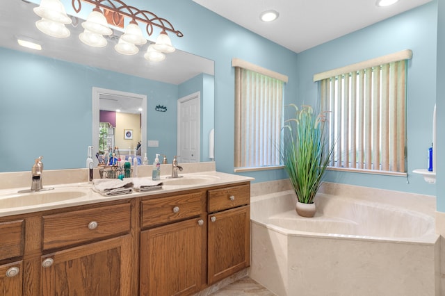 bathroom with vanity and a bathing tub