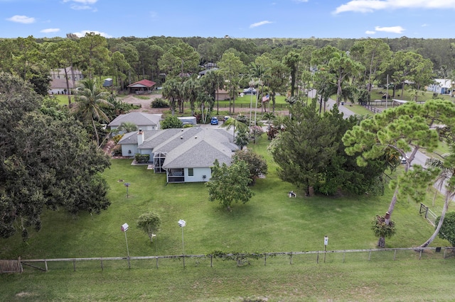 birds eye view of property with a rural view