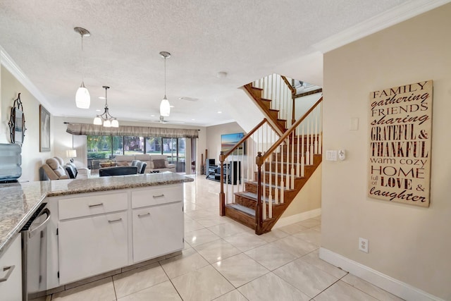 kitchen featuring white cabinetry, crown molding, dishwasher, and a textured ceiling