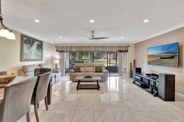 tiled living room featuring crown molding, ceiling fan, and a textured ceiling