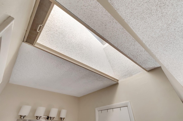 details featuring a textured ceiling