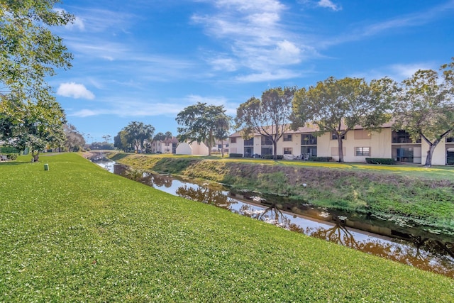 exterior space with a water view