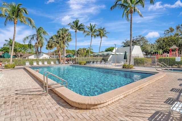 view of pool featuring a patio area