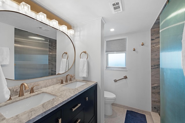 bathroom with vanity, toilet, and tile patterned flooring