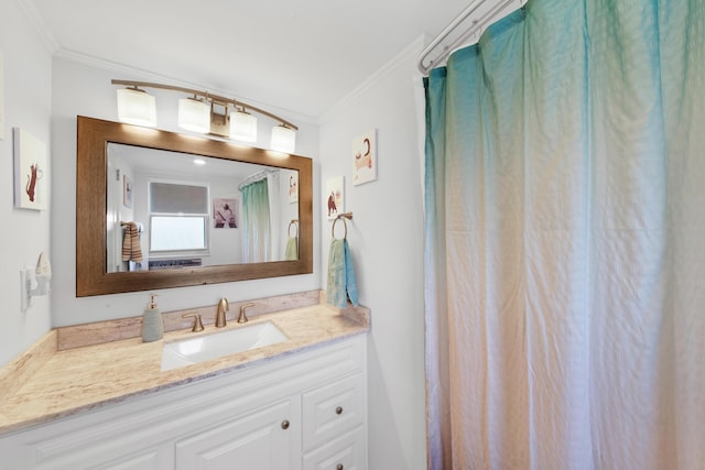 bathroom with walk in shower, vanity, and ornamental molding