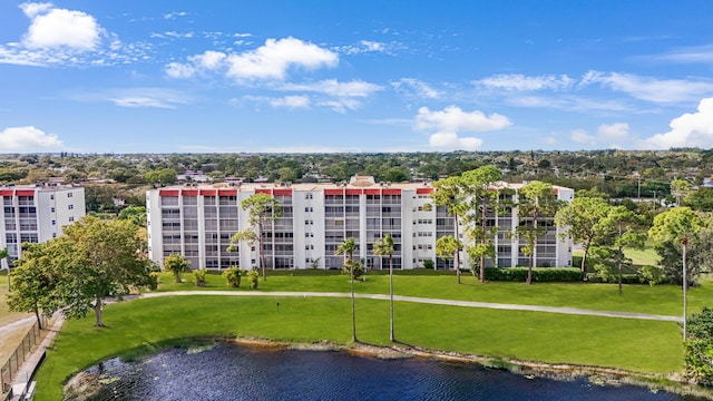 view of building exterior with a water view