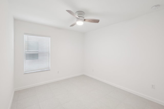 spare room featuring ceiling fan