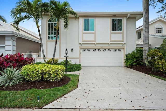 view of front of property featuring a garage