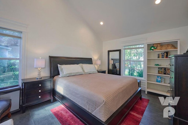 bedroom featuring lofted ceiling