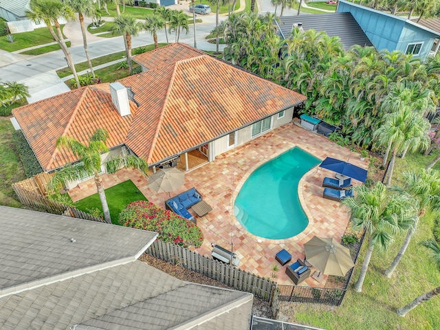 view of swimming pool with a patio area