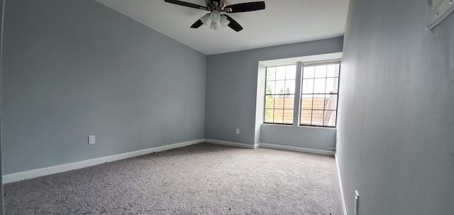 unfurnished room featuring carpet and ceiling fan