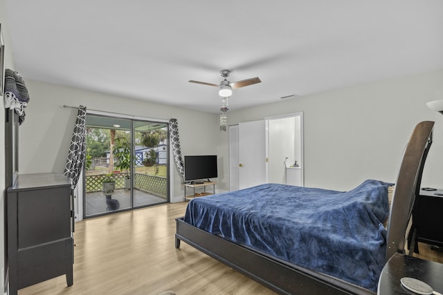 bedroom featuring light hardwood / wood-style floors, ceiling fan, and access to outside