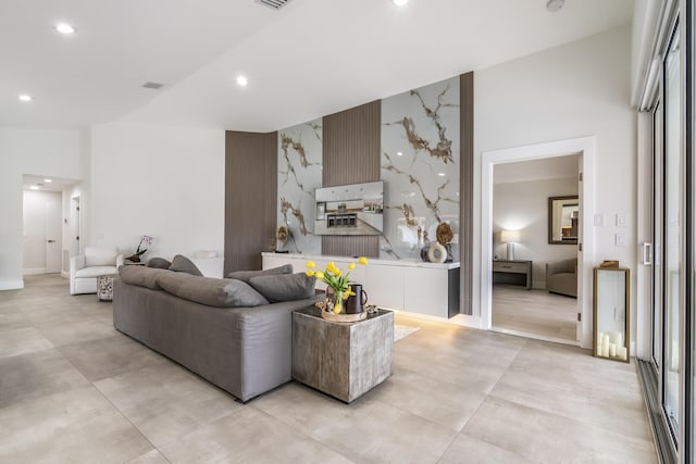 living room with vaulted ceiling