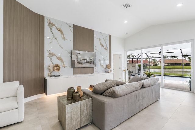 living room featuring vaulted ceiling