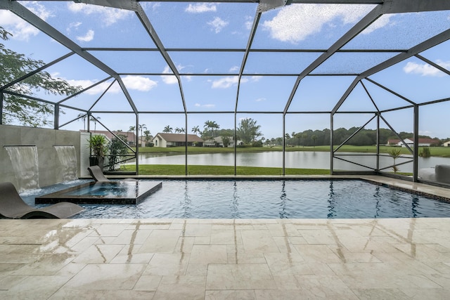 view of pool featuring an in ground hot tub, a water view, glass enclosure, and a patio