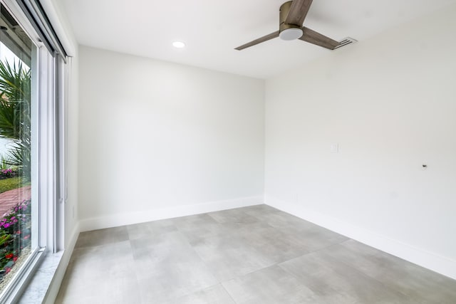 spare room featuring ceiling fan