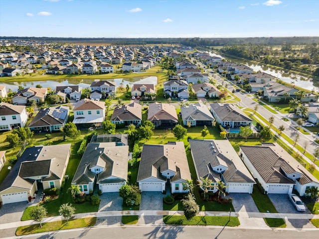 drone / aerial view featuring a water view