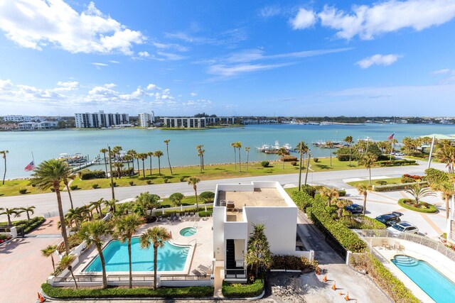 bird's eye view with a water view