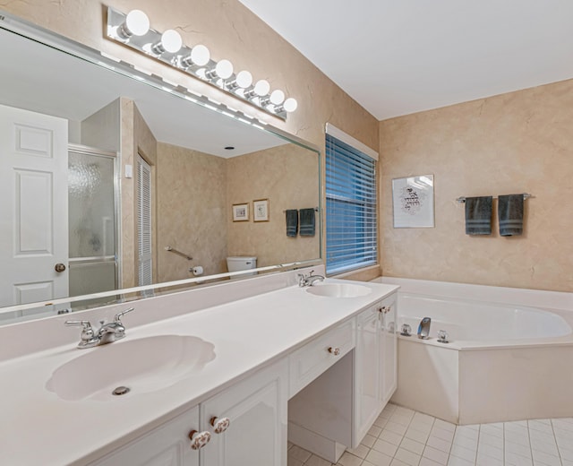 full bathroom featuring toilet, independent shower and bath, tile patterned flooring, and vanity