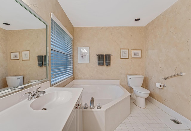 bathroom featuring toilet, tile patterned flooring, a washtub, and vanity