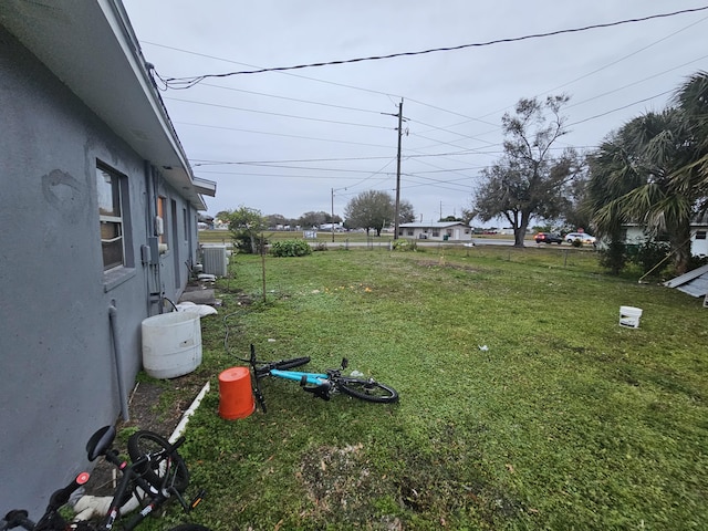 view of yard featuring central AC unit