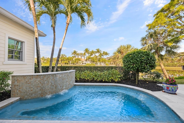 view of pool featuring pool water feature