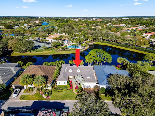 birds eye view of property featuring a water view