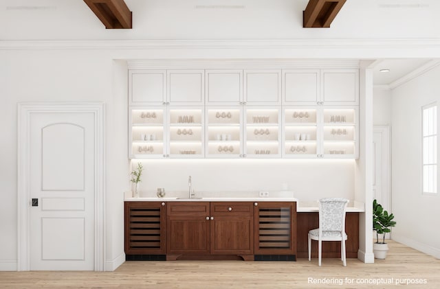 bar featuring crown molding, sink, wine cooler, and light hardwood / wood-style flooring