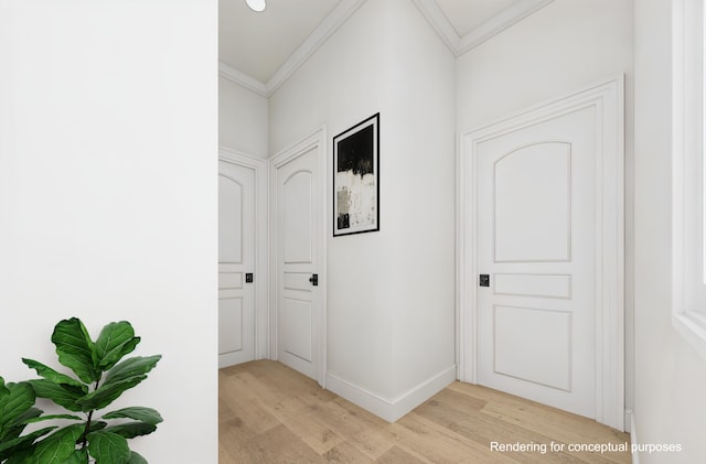 hall with light hardwood / wood-style flooring and ornamental molding