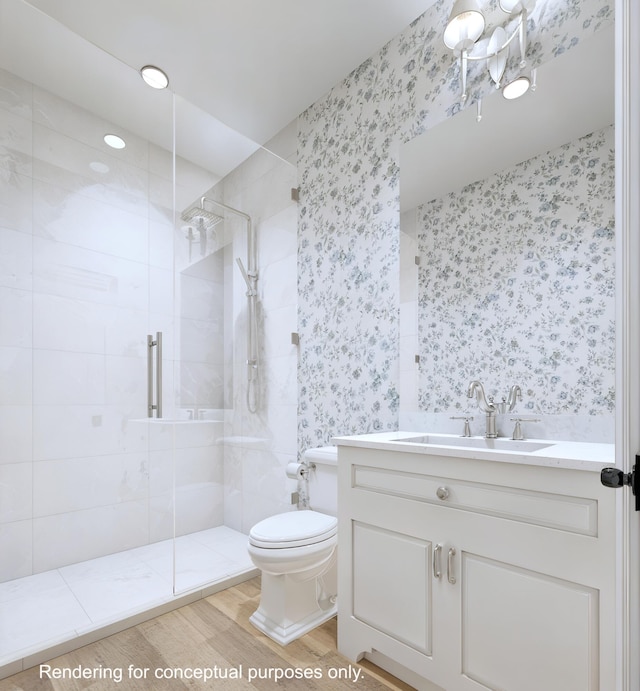 bathroom featuring vanity, hardwood / wood-style floors, a shower with door, and toilet