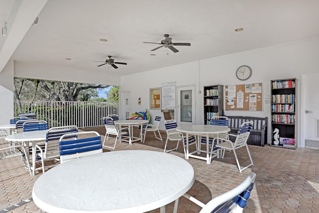 dining room featuring ceiling fan