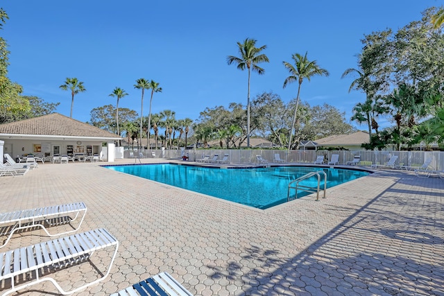 view of swimming pool featuring a patio area