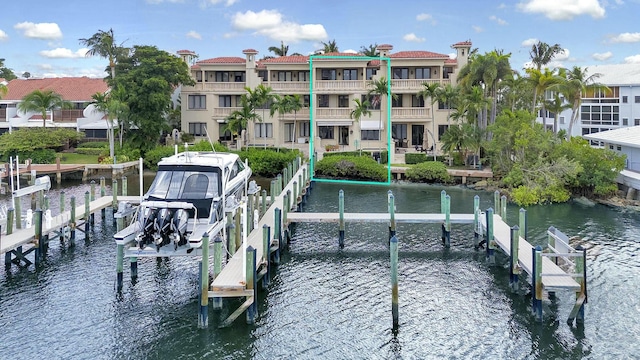 view of dock featuring a water view and boat lift