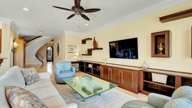 living room with stairs, ornamental molding, a ceiling fan, and recessed lighting