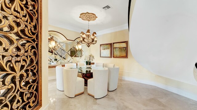 dining space with ornamental molding, visible vents, a notable chandelier, and baseboards