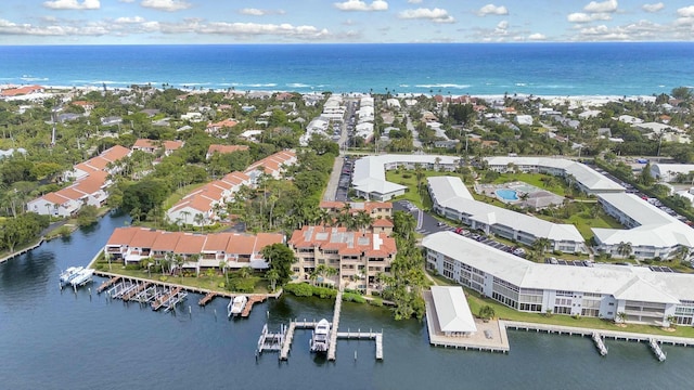 aerial view with a residential view and a water view