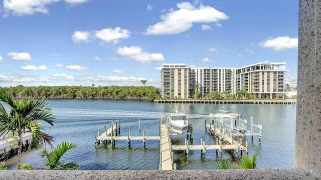 view of dock with a water view and boat lift