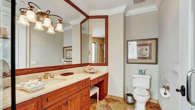 bathroom with toilet, stone finish flooring, ornamental molding, and vanity