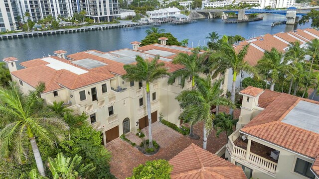 birds eye view of property featuring a water view