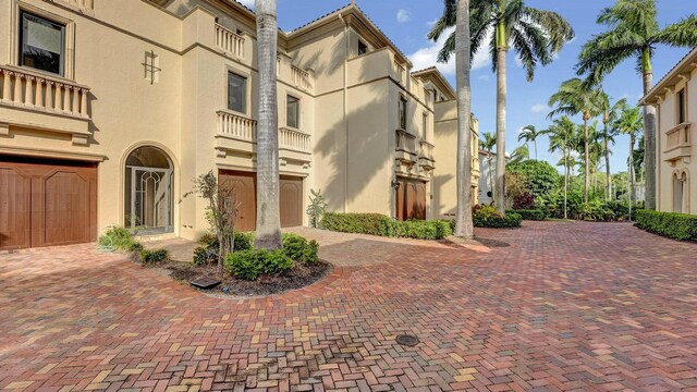 view of building exterior with driveway