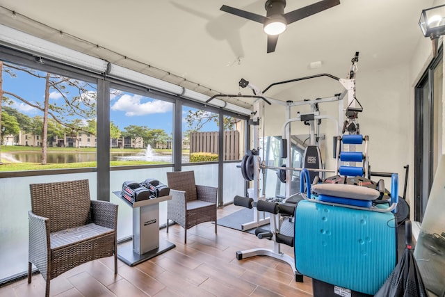 workout room with ceiling fan and a wealth of natural light