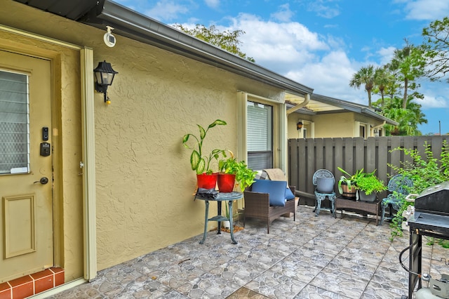 view of patio featuring a grill