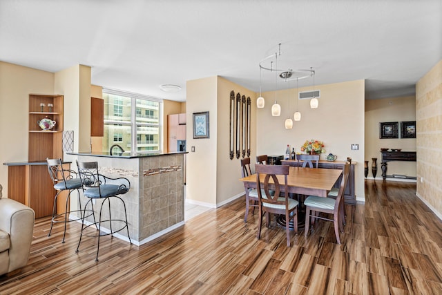 dining room featuring hardwood / wood-style floors