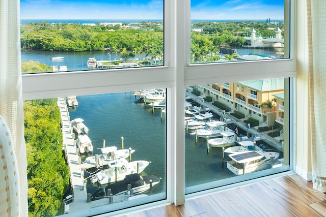 interior space featuring a water view and hardwood / wood-style flooring