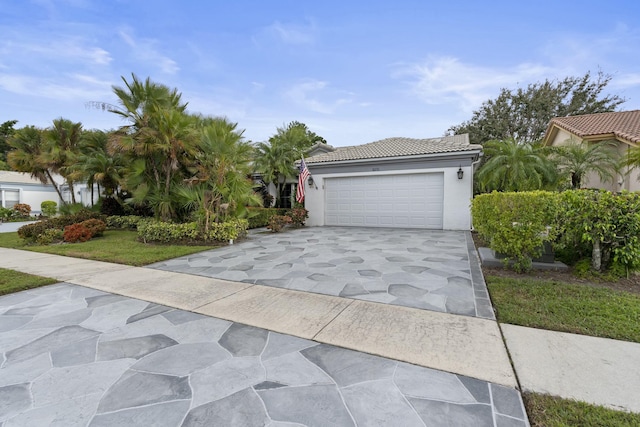 view of front of property with a garage