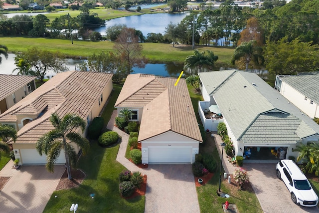 drone / aerial view featuring a water view